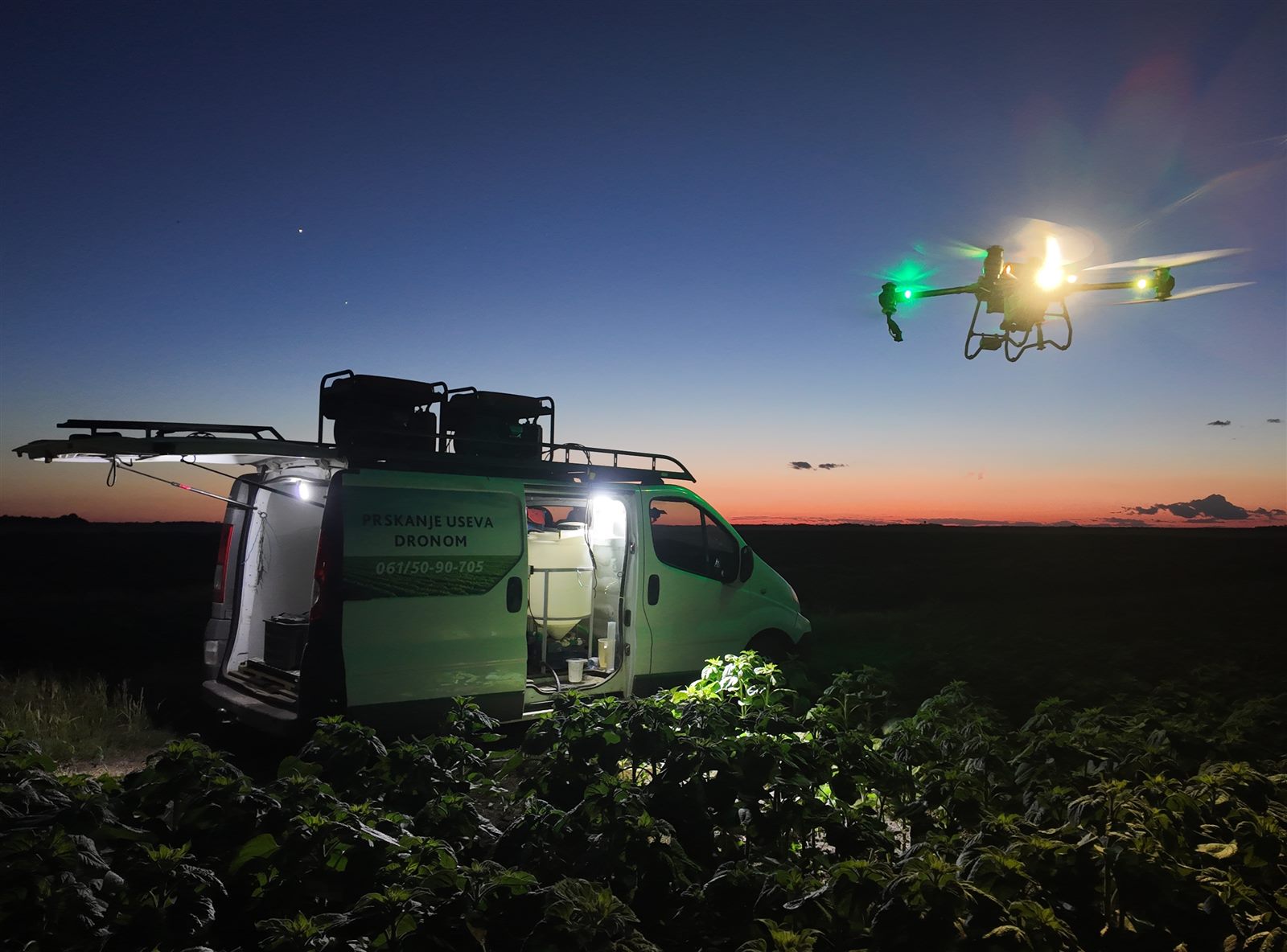 Agricultural drone flying beside the support vehicle at dusk