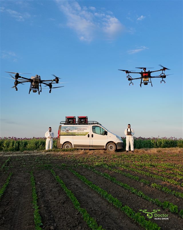 Two drones over a field, without heavy machinery entering the crop
